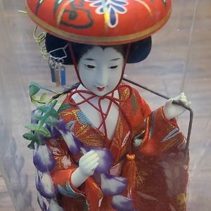Elegant Red and Purple Geisha Figurine